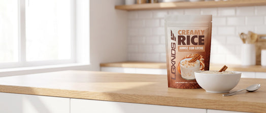 Creamy Rice Arroz con Leche pouch beside a bowl with a cinnamon stick
